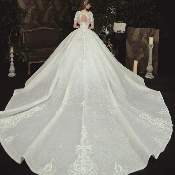Elegant Champagne Bridal Wedding Dresses 2020 Ball Gown See-through Scoop Neck Short Sleeve Backless Glitter Tulle Beading Tassel Appliques Lace Cathedral Train Ruffle
