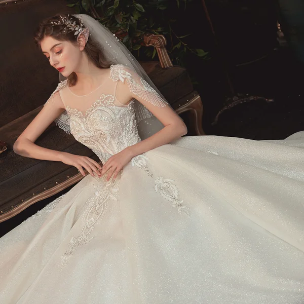 Elegant Champagne Bridal Wedding Dresses 2020 Ball Gown See-through Scoop Neck Short Sleeve Backless Glitter Tulle Beading Tassel Appliques Lace Cathedral Train Ruffle