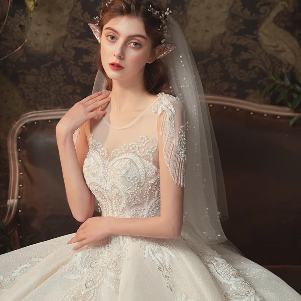 Elegant Champagne Bridal Wedding Dresses 2020 Ball Gown See-through Scoop Neck Short Sleeve Backless Glitter Tulle Beading Tassel Appliques Lace Cathedral Train Ruffle