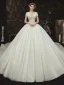 Romantique Champagne La Mariée Robe De Mariée 2020 Robe Boule Transparentes Col v profond Manches Courtes Dos Nu Appliques En Dentelle Perlage Glitter Tulle Cathedral Train Volants