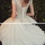 Romantique Champagne La Mariée Robe De Mariée 2020 Robe Boule Transparentes Col v profond Manches Courtes Dos Nu Appliques En Dentelle Perlage Glitter Tulle Cathedral Train Volants