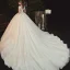 Romantique Champagne La Mariée Robe De Mariée 2020 Robe Boule Transparentes Col v profond Manches Courtes Dos Nu Appliques En Dentelle Perlage Glitter Tulle Cathedral Train Volants