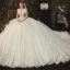 Romantique Champagne La Mariée Robe De Mariée 2020 Robe Boule Transparentes Col v profond Manches Courtes Dos Nu Appliques En Dentelle Perlage Glitter Tulle Cathedral Train Volants