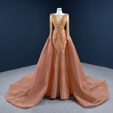 Luxe Orange Tapis Rouge Robe De Soirée 2020 Princesse Transparentes Encolure Dégagée Manches Longues Fait Main Perlage Paillettes Tribunal Train Volants Dos Nu