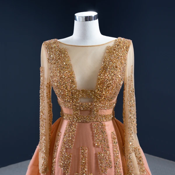 Luxe Orange Tapis rouge Robe De Soirée 2020 Princesse Transparentes Encolure Dégagée Manches Longues Fait main Perlage Paillettes Tribunal Train Volants Dos Nu