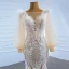 Luxe Champagne La Mariée Robe De Mariée 2020 Trompette / Sirène Transparentes Encolure Carrée Gonflée Manches Longues Dos Nu Appliques En Dentelle Plumes Train De Balayage Volants