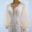 Luxe Champagne La Mariée Robe De Mariée 2020 Trompette / Sirène Transparentes Encolure Carrée Gonflée Manches Longues Dos Nu Appliques En Dentelle Plumes Train De Balayage Volants