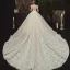 Romantique Champagne La Mariée Robe De Mariée 2020 Robe Boule Transparentes Encolure Carrée Manches Courtes Dos Nu Fleur Appliques En Dentelle Perlage Glitter Tulle Cathedral Train