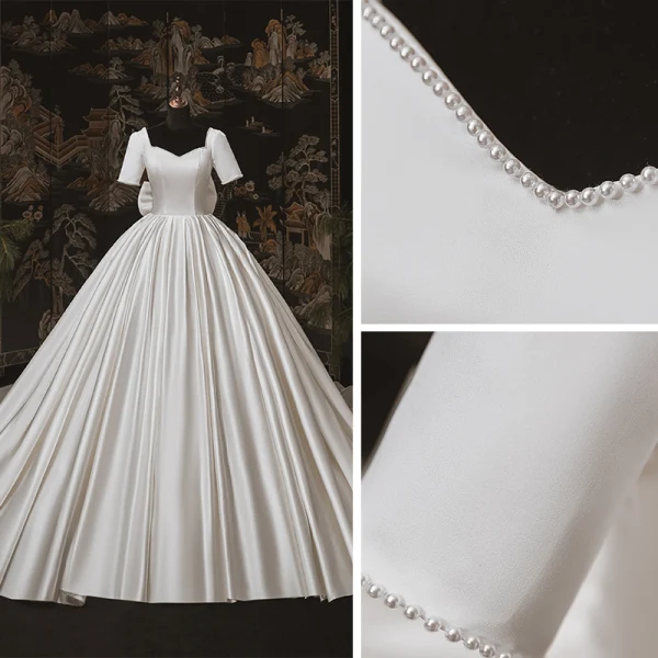 Luxury / Gorgeous Ivory Satin Bridal Wedding Dresses 2020 Ball Gown Square Neckline Short Sleeve Backless Bow Beading Pearl Chapel Train Ruffle