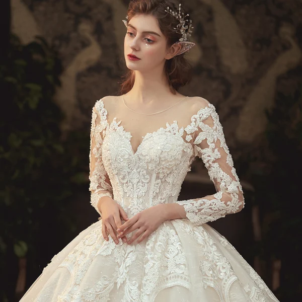 Charming Champagne See-through Bridal Wedding Dresses 2020 Ball Gown Scoop Neck 3/4 Sleeve Appliques Lace Beading Pearl Cathedral Train Ruffle
