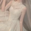 Vintage / Retro Champagne See-through Bridal Wedding Dresses 2020 Ball Gown High Neck Sleeveless Backless Appliques Lace Beading Glitter Tulle Cathedral Train Ruffle