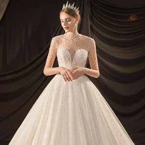 Luxe Ivoire Transparentes La Mariée Robe De Mariée 2020 Robe Boule Col Haut Manches Courtes Dos Nu Glitter Tulle Perlage Perle Cathedral Train Volants