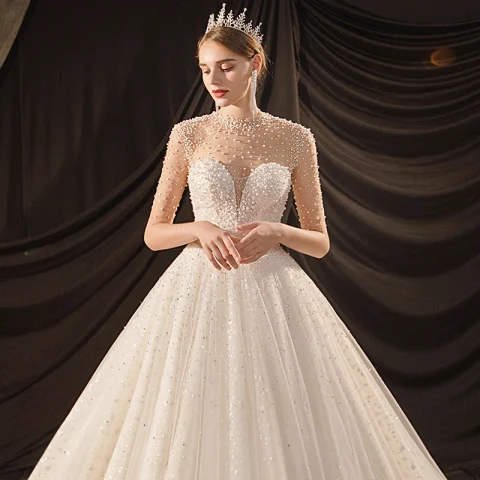 Luxury / Gorgeous Ivory See-through Bridal Wedding Dresses 2020 Ball Gown High Neck Short Sleeve Backless Glitter Tulle Beading Pearl Cathedral Train Ruffle