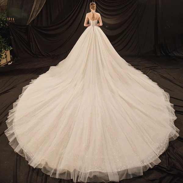 Luxe Ivoire Transparentes La Mariée Robe De Mariée 2020 Robe Boule Col Haut Manches Courtes Dos Nu Glitter Tulle Perlage Perle Cathedral Train Volants