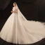 Luxe Ivoire Transparentes La Mariée Robe De Mariée 2020 Robe Boule Col Haut Manches Courtes Dos Nu Glitter Tulle Perlage Perle Cathedral Train Volants