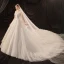 Luxury / Gorgeous Ivory See-through Bridal Wedding Dresses 2020 Ball Gown Scoop Neck 3/4 Sleeve Backless Glitter Tulle Appliques Lace Beading Cathedral Train Ruffle
