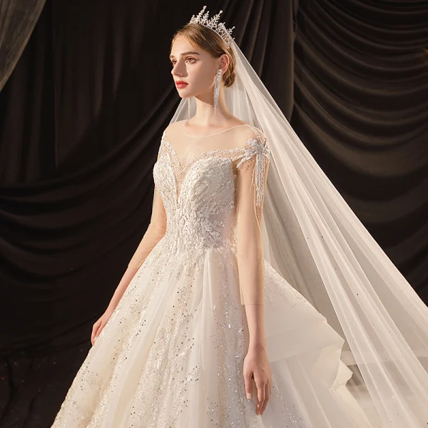 Luxury / Gorgeous Ivory See-through Bridal Wedding Dresses 2020 Ball Gown Scoop Neck 3/4 Sleeve Backless Glitter Tulle Appliques Lace Beading Cathedral Train Ruffle