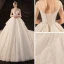 Luxury / Gorgeous Ivory See-through Bridal Wedding Dresses 2020 Ball Gown Scoop Neck 3/4 Sleeve Backless Glitter Tulle Appliques Lace Beading Cathedral Train Ruffle