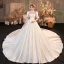 Vintage / Originale Ivoire Satin Transparentes La Mariée Robe De Mariée 2020 Robe Boule Col Haut Gonflée Manches Courtes Dos Nu Noeud Perlage Perle Cathedral Train Volants