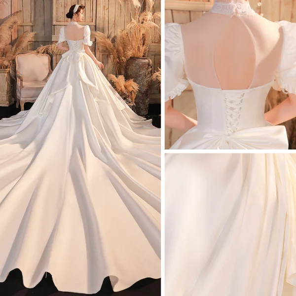 Vintage / Originale Ivoire Satin Transparentes La Mariée Robe De Mariée 2020 Robe Boule Col Haut Gonflée Manches Courtes Dos Nu Noeud Perlage Perle Cathedral Train Volants