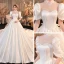 Vintage / Originale Ivoire Satin Transparentes La Mariée Robe De Mariée 2020 Robe Boule Col Haut Gonflée Manches Courtes Dos Nu Noeud Perlage Perle Cathedral Train Volants