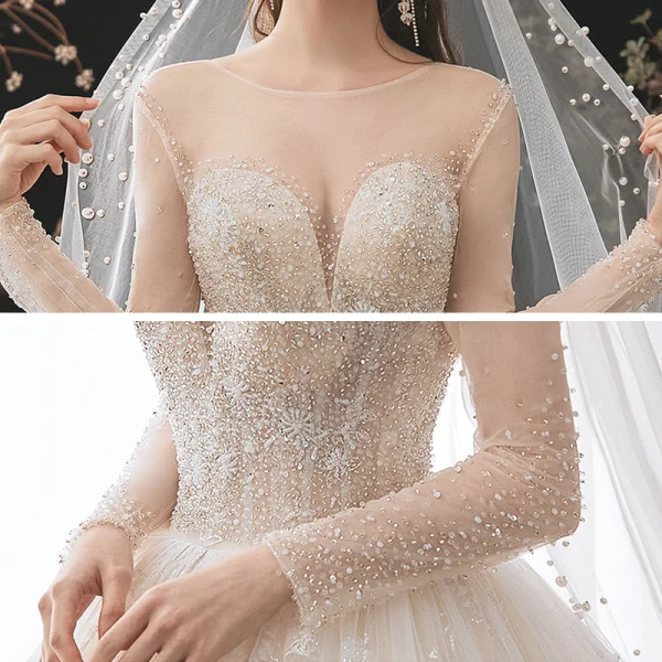 Romantic Champagne See-through Bridal Wedding Dresses 2020 Ball Gown Scoop Neck Long Sleeve Backless Appliques Lace Beading Glitter Tulle Cathedral Train Ruffle