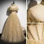 Vintage / Retro Champagne Gold Dancing Prom Dresses 2020 A-Line / Princess See-through High Neck Beading Short Sleeve Glitter Tulle Floor-Length / Long Ruffle Backless Formal Dresses