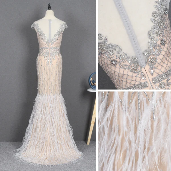 Illusion Champagne Transparentes Tapis rouge Robe De Soirée 2020 Trompette / Sirène Encolure Dégagée Sans Manches Perlage Faux Diamant Plumes Train De Balayage Volants Robe De Ceremonie