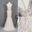 Illusion Champagne Transparentes Tapis rouge Robe De Soirée 2020 Trompette / Sirène Encolure Dégagée Sans Manches Perlage Faux Diamant Plumes Train De Balayage Volants Robe De Ceremonie