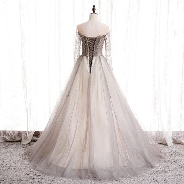 Charmant Champagne Dansant Robe De Bal 2020 Princesse Transparentes Encolure Dégagée Manches Longues Perlage Glitter Tulle Train De Balayage Volants Dos Nu Robe De Ceremonie