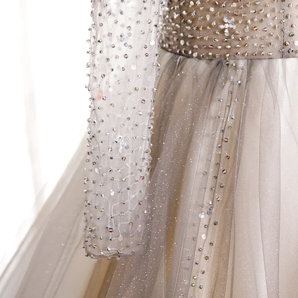 Charmant Champagne Dansant Robe De Bal 2020 Princesse Transparentes Encolure Dégagée Manches Longues Perlage Glitter Tulle Train De Balayage Volants Dos Nu Robe De Ceremonie