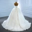 Luxe Blanche Satin La Mariée Robe De Mariée 2020 Robe Boule Bustier Sans Manches Dos Nu Fait main Perlage Perle Chapel Train Volants