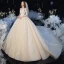 High-end Champagne See-through Bridal Wedding Dresses 2020 Ball Gown Scoop Neck 3/4 Sleeve Backless Leaf Appliques Lace Beading Glitter Tulle Cathedral Train Ruffle