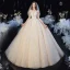 High-end Champagne See-through Bridal Wedding Dresses 2020 Ball Gown Scoop Neck 3/4 Sleeve Backless Leaf Appliques Lace Beading Glitter Tulle Cathedral Train Ruffle