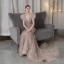 Luxe Champagne Tapis rouge Robe De Soirée 2020 Trompette / Sirène Col v profond Sans Manches Plumes Perlage Train De Balayage Volants Dos Nu Robe De Ceremonie