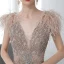 Luxe Champagne Tapis rouge Robe De Soirée 2020 Trompette / Sirène Col v profond Sans Manches Plumes Perlage Train De Balayage Volants Dos Nu Robe De Ceremonie