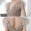 Luxe Champagne Tapis rouge Robe De Soirée 2020 Trompette / Sirène Col v profond Sans Manches Plumes Perlage Train De Balayage Volants Dos Nu Robe De Ceremonie
