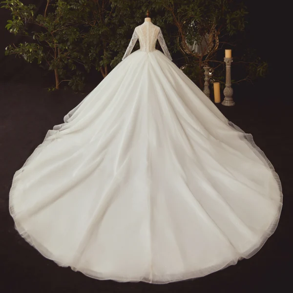 Illusion Ivory Bridal Wedding Dresses 2021 Ball Gown V-Neck Long Sleeve Appliques Lace Beading Glitter Tulle Cathedral Train Ruffle