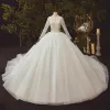 Illusion Ivory Bridal Wedding Dresses 2021 Ball Gown V-Neck Long Sleeve Appliques Lace Beading Glitter Tulle Cathedral Train Ruffle