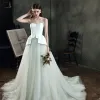 Fantastiske / Unike Elfenben Bryllups Brudekjoler 2021 Prinsesse Kjæreste Uten Ermer Ryggløse Appliques Blomst Beading Feie Tog Buste