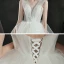Ivoire Jardin / Extérieur Légère Robe De Mariée 2021 Robe Boule Transparentes Col v profond Sans Manches Dos Nu Appliques Fleur Perlage Train De Balayage