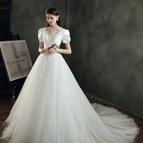Affordable Ivory Satin Bridal Wedding Dresses 2021 A-Line / Princess Deep V-Neck Puffy Short Sleeve Backless Chapel Train Ruffle