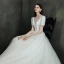 Abordable Ivoire Satin La Mariée Robe De Mariée 2021 Princesse Col v profond Gonflée Manches Courtes Dos Nu Chapel Train Volants