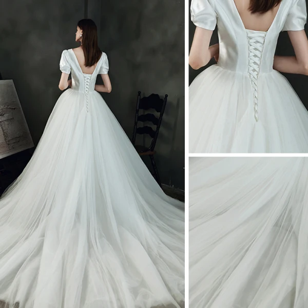Abordable Ivoire Satin La Mariée Robe De Mariée 2021 Princesse Col v profond Gonflée Manches Courtes Dos Nu Chapel Train Volants