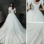 Abordable Ivoire Satin La Mariée Robe De Mariée 2021 Princesse Col v profond Gonflée Manches Courtes Dos Nu Chapel Train Volants