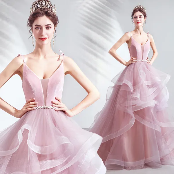 Stunning Blushing Pink Princess Prom Dresses 2021 Spaghetti Straps Deep V-Neck Sleeveless Pearl Bow Sash Backless Ruffle Court Train Formal Dresses