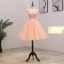 Abordable Orange Robe De Fete 2021 Princesse Encolure Dégagée Sans Manches Appliques En Dentelle Perlage Perle Courte Volants Dos Nu Robe De Ceremonie