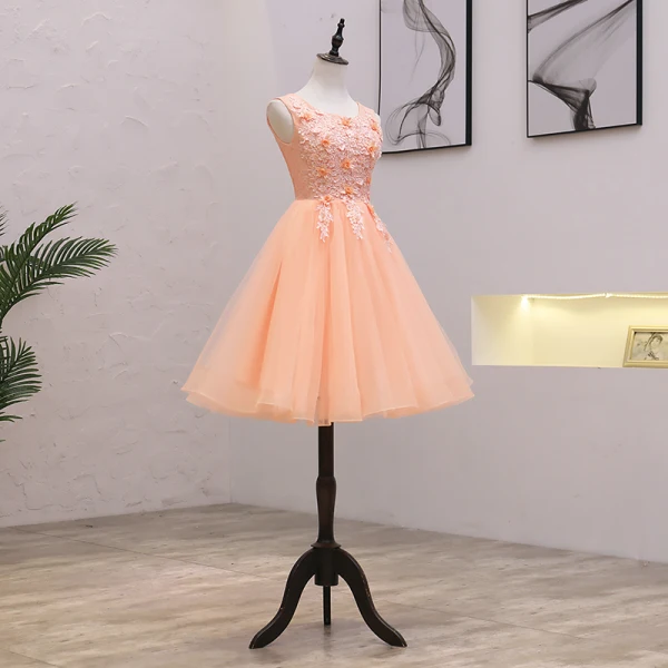 Abordable Orange Robe De Fete 2021 Princesse Encolure Dégagée Sans Manches Appliques En Dentelle Perlage Perle Courte Volants Dos Nu Robe De Ceremonie