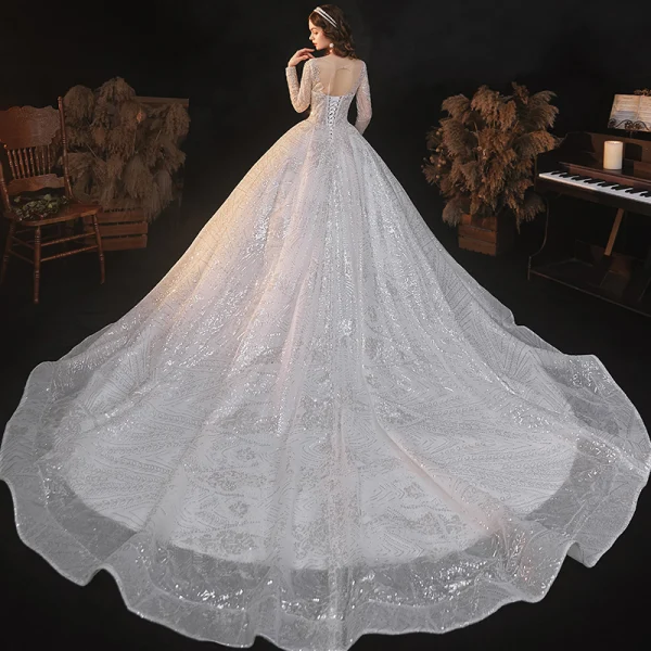 Sparkly Ivory See-through Bridal Wedding Dresses 2021 Ball Gown Scoop Neck Long Sleeve Backless Beading Sequins Cathedral Train Ruffle
