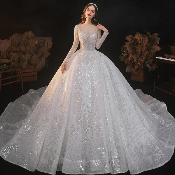 Sparkly Ivory See-through Bridal Wedding Dresses 2021 Ball Gown Scoop Neck Long Sleeve Backless Beading Sequins Cathedral Train Ruffle